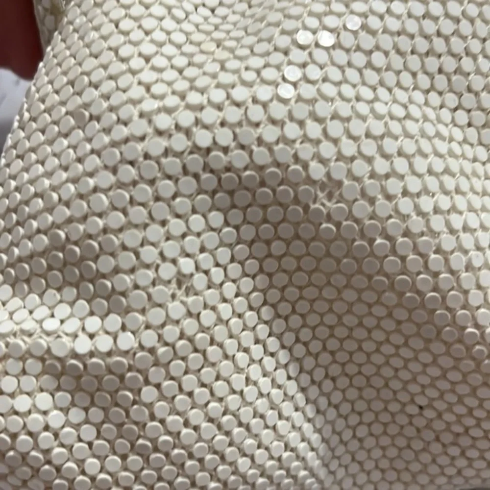 Dainty special occasion clutch with snap hinge closure cream